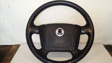 Load image into Gallery viewer, SSANGYONG REXTON STEERING WHEEL COMPLETE 2.7 MANUAL 2004

